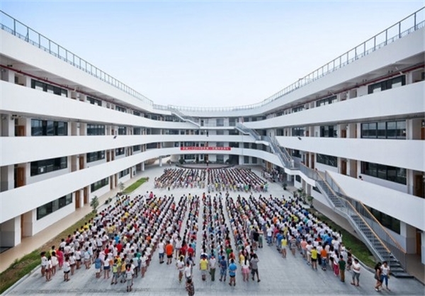 (تصاویر) دو و میدانی روی پشت‌بام مدرسه‌ای در چین