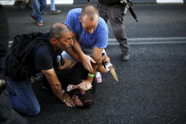 (تصاویر) چاقوکشی در رژه همجنسگرایان اسرائیل