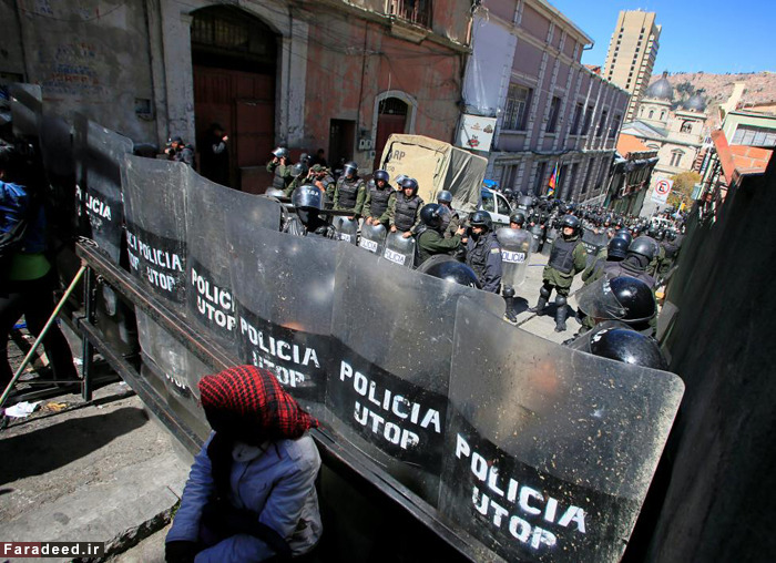 (تصاویر) درگیری پلیس بولیوی با معلولان