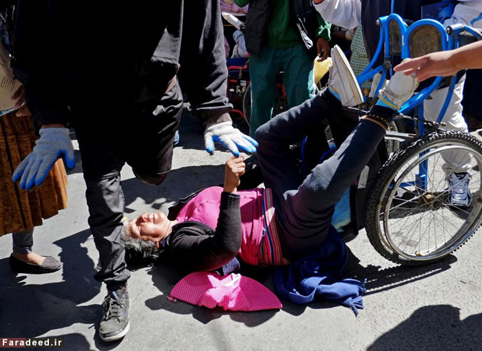 (تصاویر) درگیری پلیس بولیوی با معلولان