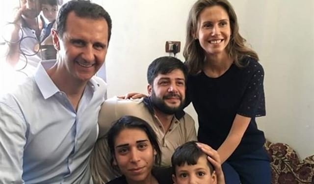 عیادت اسد و همسرش از مجروحان جنگ +(تصاویر)