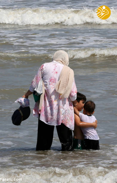 خبرگزاری فرانسه,دریای خزر,ساحل ایزدشهر,فصل تابستان,لذت بردن ایرانیان از دریای خز