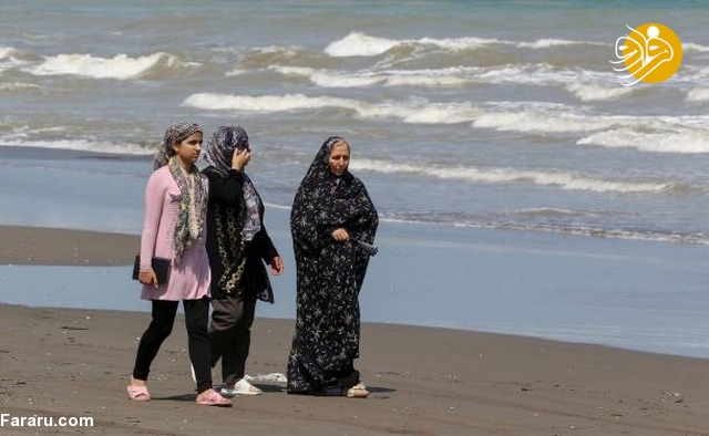 خبرگزاری فرانسه,دریای خزر,ساحل ایزدشهر,فصل تابستان,لذت بردن ایرانیان از دریای خز