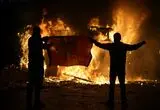 تصاویر؛ درگیری، آتش‌سوزی و گاز اشک‌آور در آلبانی