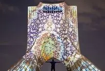 تصاویر؛ نورپردازی برج آزادی با تصاویر فرش دستباف ایران