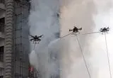 اطفای حریق یک برج توسط پهپادها
