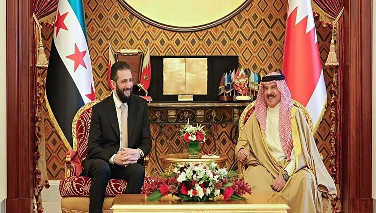 دیدار پادشاه بحرین با رئیس دولت موقت سوریه در منامه
