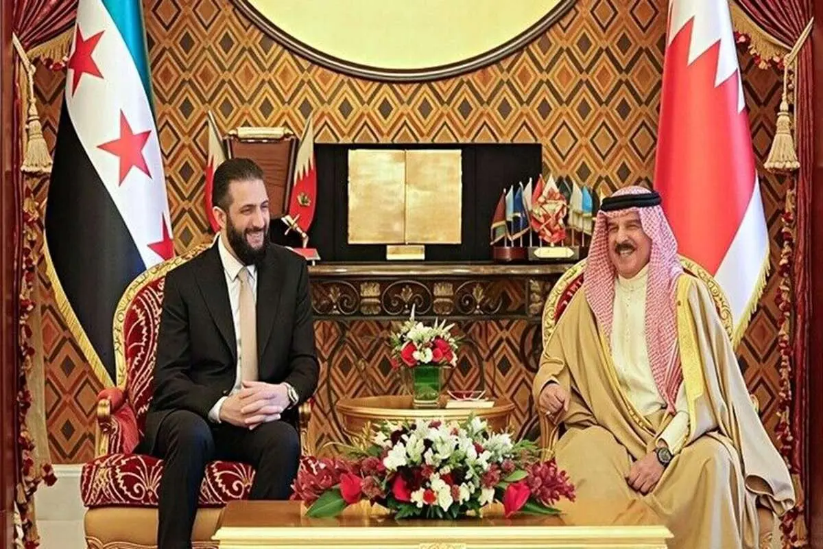 دیدار پادشاه بحرین با رئیس دولت موقت سوریه در منامه
