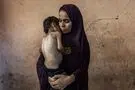 تصاویر؛ از زنان جنگ‌زده تا مزارع فرش