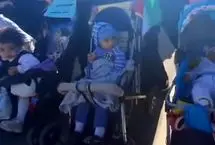 کودکان کالسکه‌سوار در تجمع جانفدا