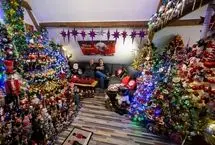 تصاویر؛ رکوردشکنی خانه‌ای با ۶۲۱ درخت کریسمس تزئین‌شده