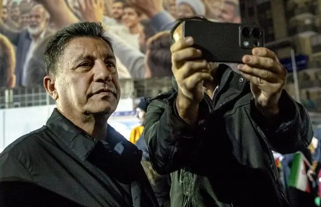 عکس؛ امیر قلعه‌نویی در اجتماع شبانه