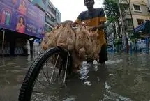 تصاویر؛ بارش‌های شدید موسمی در شرق هند جان ۹ نفر را گرفت