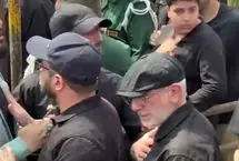 حضور سردار قاآنی و همسرش در مراسم تشییع پیکر شهیدان باقری و حاجی‌زاده