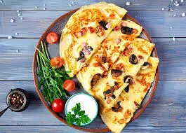طرز تهیه کرپ پیتزا؛ صبحانه خاص و خوشمزه

