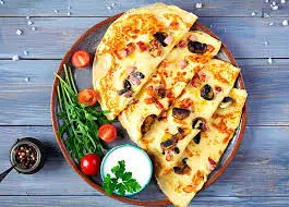 طرز تهیه کرپ پیتزا؛ صبحانه خاص و خوشمزه

