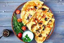 طرز تهیه کرپ پیتزا؛ صبحانه خاص و خوشمزه

