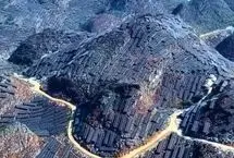 رشته‌کوه‌های پوشیده از تأسیسات بزرگ پنل خورشیدی در چین