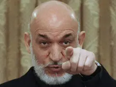 کرزی: افغانها یاد دارند با «اشغالگران» چگونه برخورد کنند