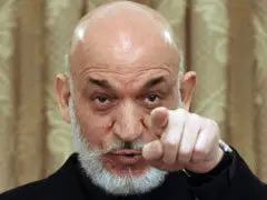 کرزی: افغانها یاد دارند با «اشغالگران» چگونه برخورد کنند