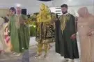 عروس با پوشش زردوزی شده برای دفع چشم‌زخم