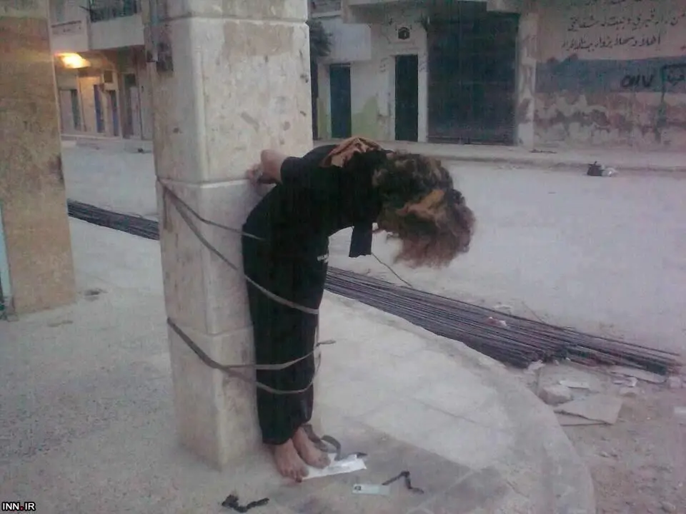 (تصویر) قتل فجیع زن سوری توسط معارضان