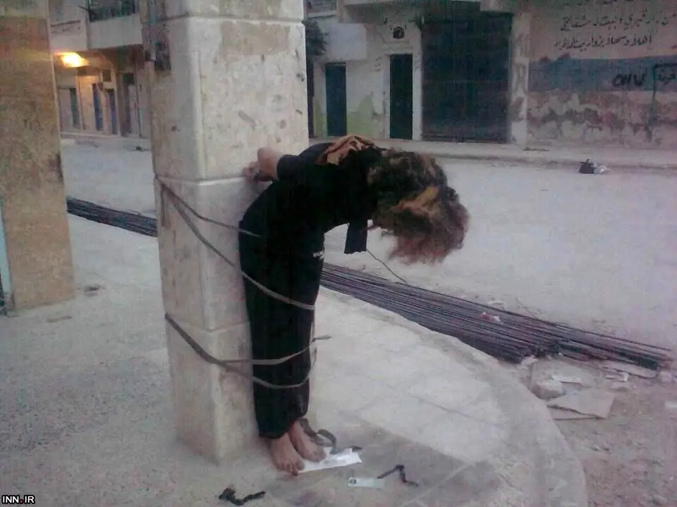 (تصویر) قتل فجیع زن سوری توسط معارضان
