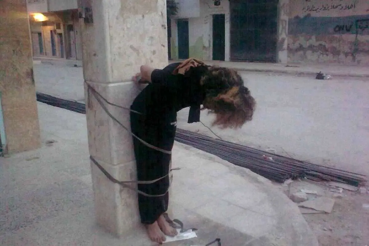 (تصویر) قتل فجیع زن سوری توسط معارضان
