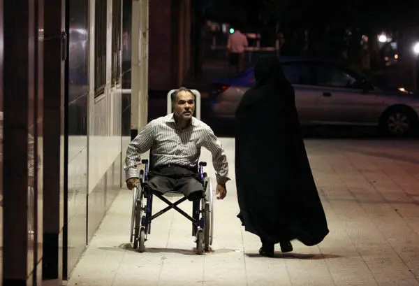(تصاویر) پزشک جانباز و قهرمان شنا