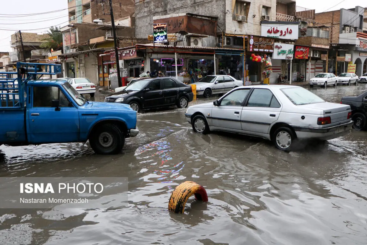 (تصاویر) بارش باران و آبگرفتگی معابر در اهواز
