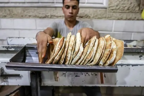 تصاویر؛ تولید نان در غزه از سر گرفته شد