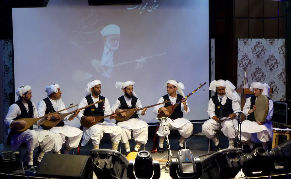 (تصاویر) تقدیر از استاد عثمان محمدپرست