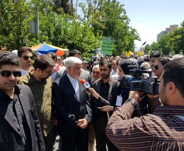 (تصویر) حضور دو رقیب ریاست مجلس در راهپیمایی