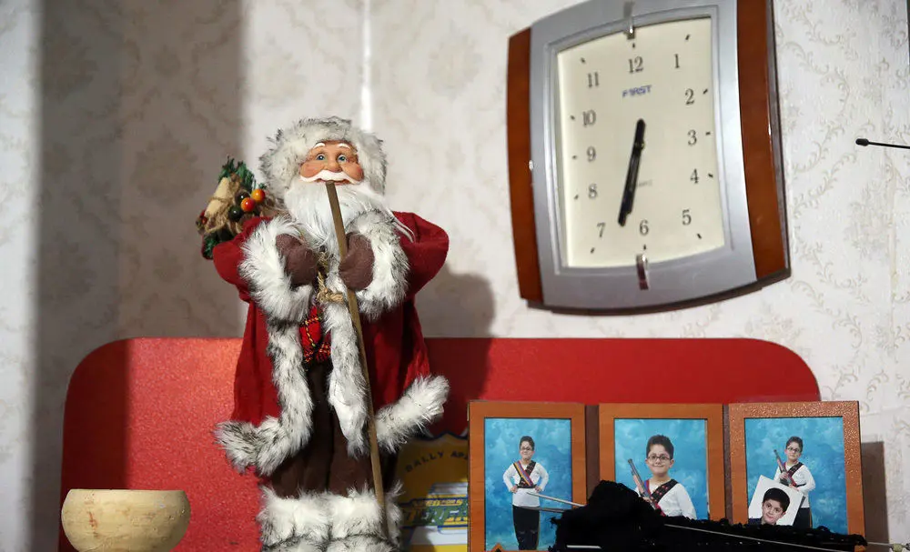 (تصاویر) دیدار روحانی با خانواده «آلفرد گبری» شهید ارمنی