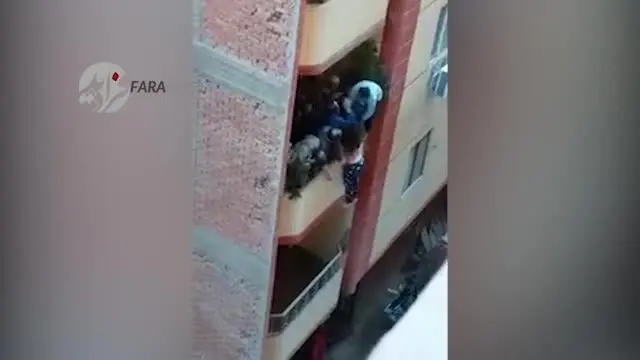 (ویدیو) نجات زنی که شوهرش او را از بالکن پرتاب کرد!