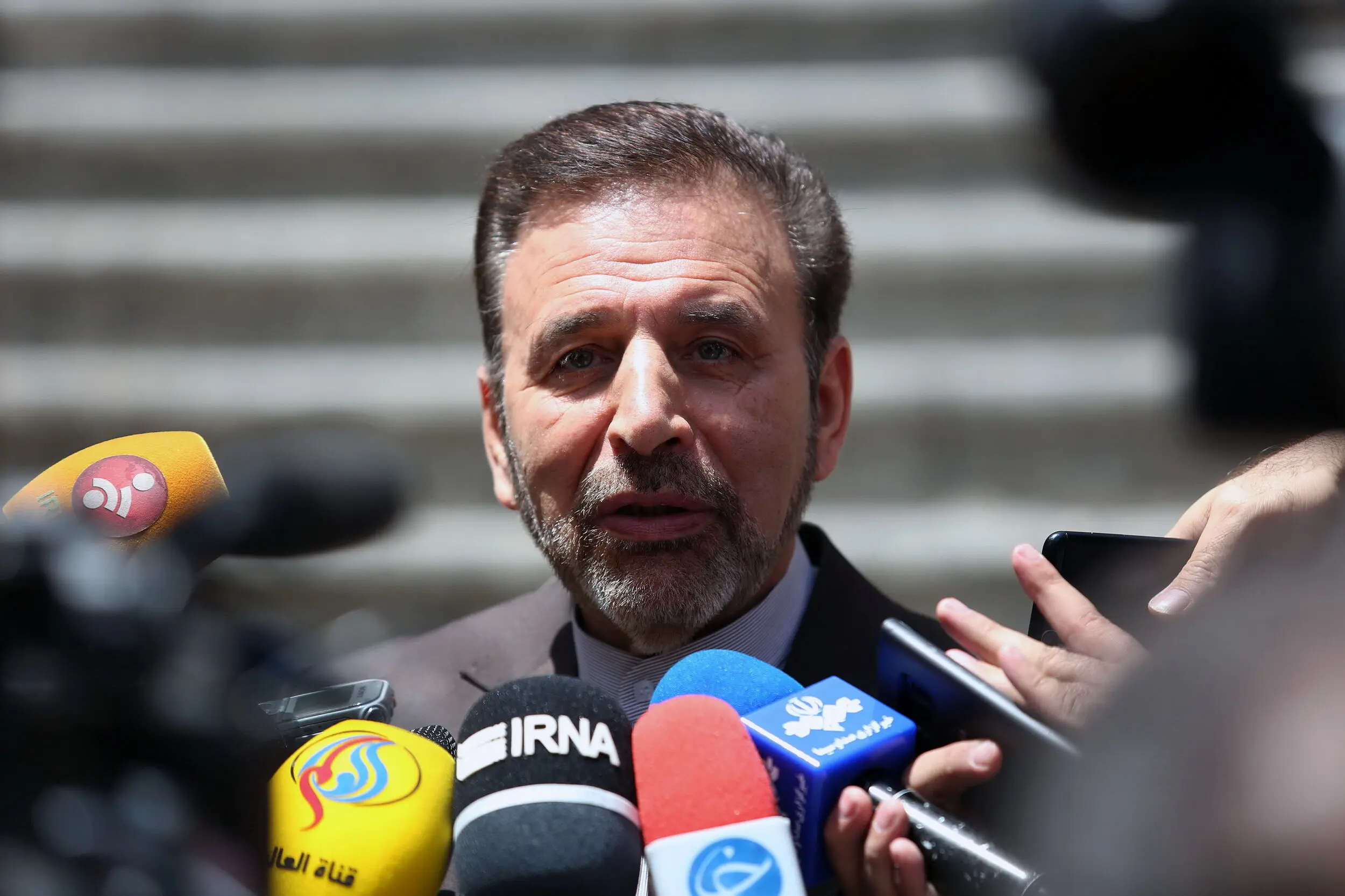 واعظی: دفتر رئیس جمهوری از سفر اسد به تهران اطلاع نداشت