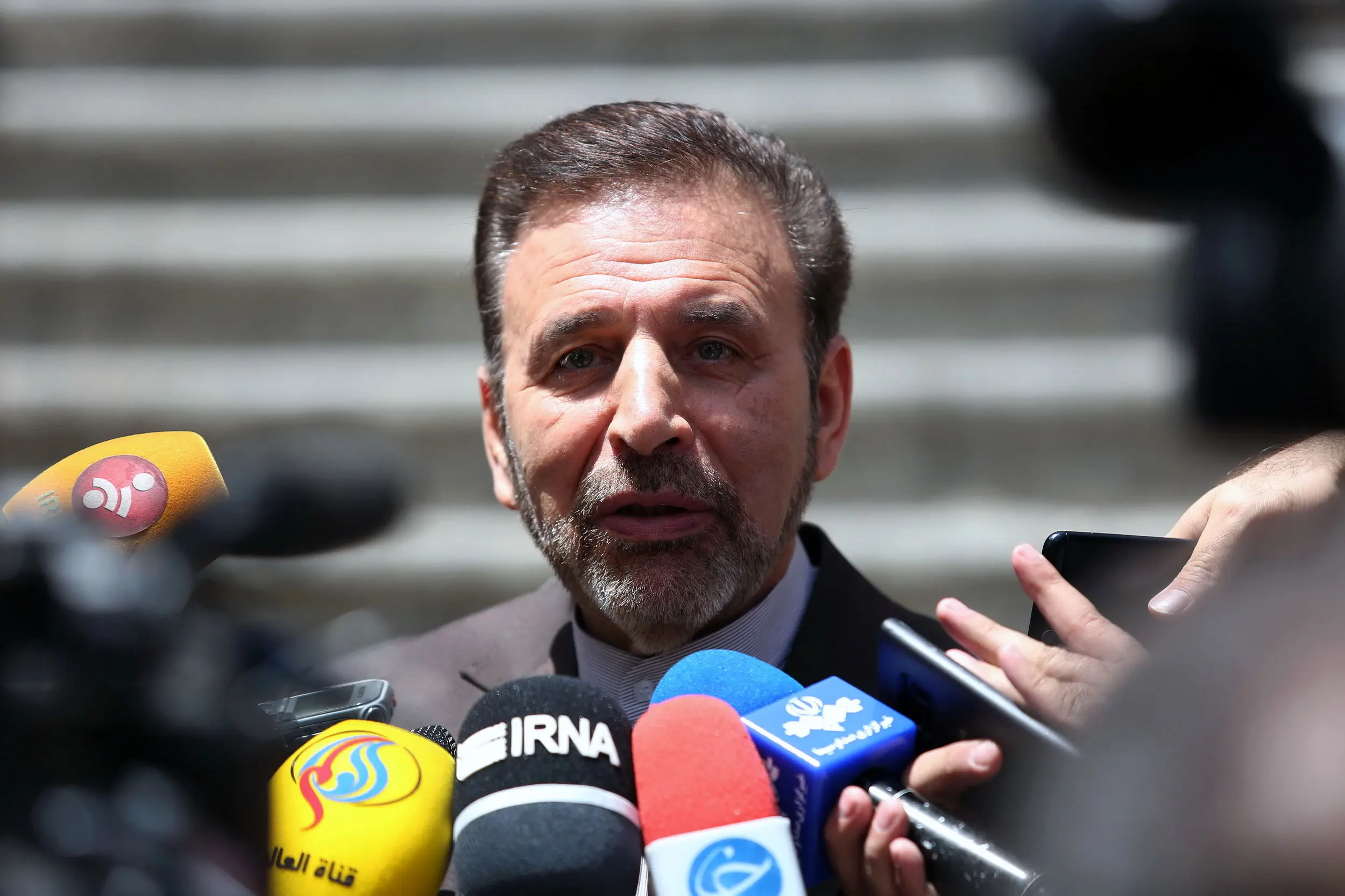 واعظی: دفتر رئیس جمهوری از سفر اسد به تهران اطلاع نداشت