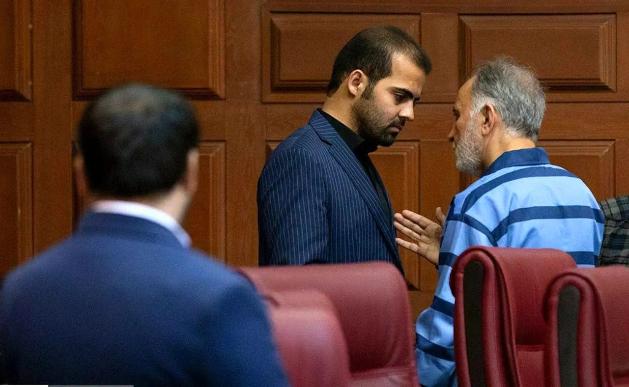 (عکس) گفتگوی نجفی با برادر میترا استاد