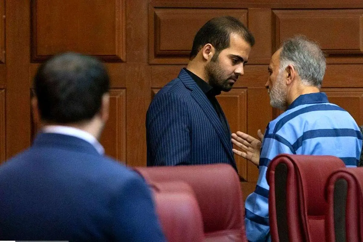 (عکس) گفتگوی نجفی با برادر میترا استاد