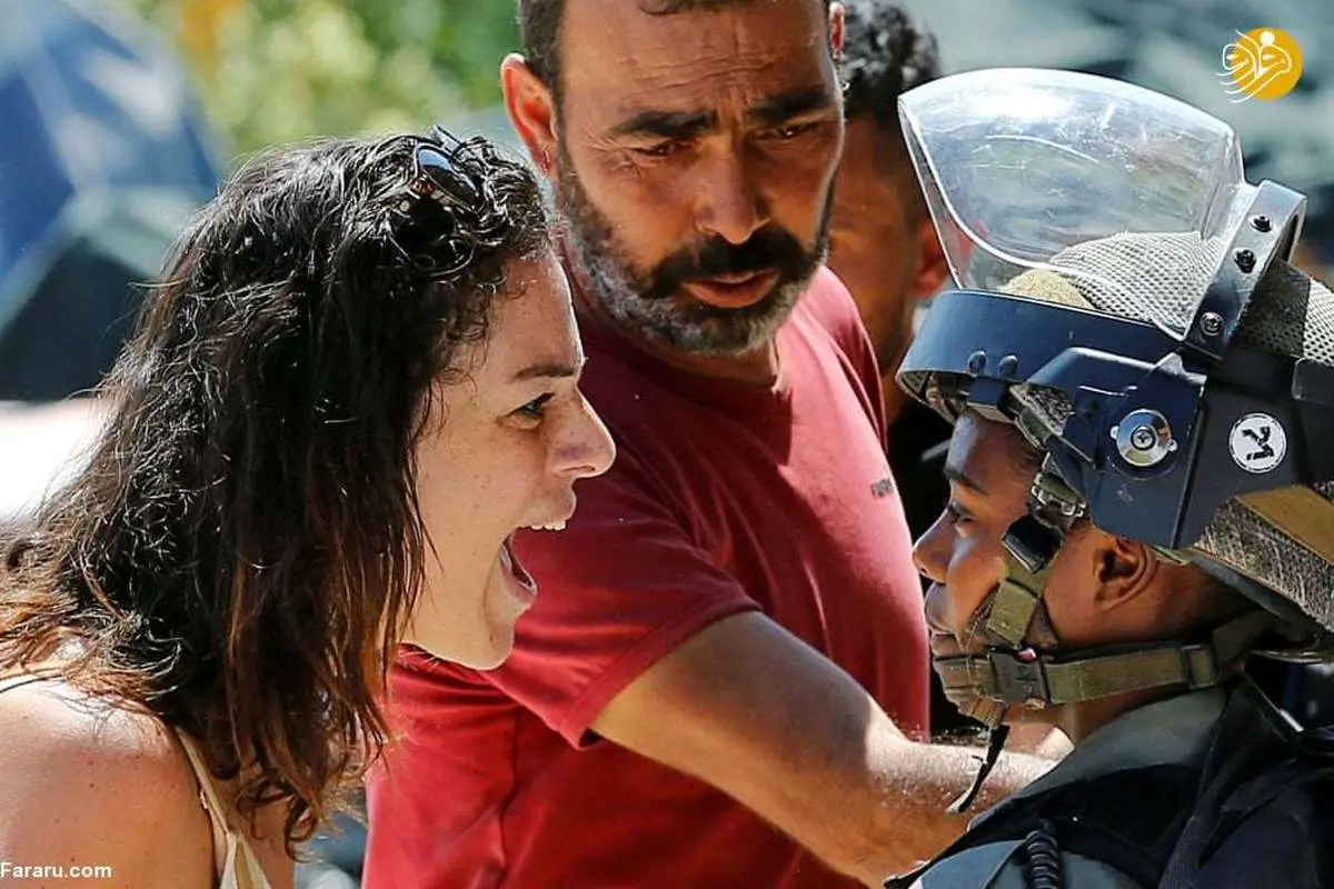 (تصاویر) مقاومت زن فلسطینی برای جلوگیری از تخریب خانهاش