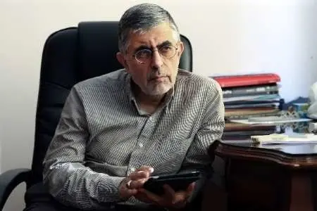 کنایه کرباسچی به منتقدان خنده‌های روحانی