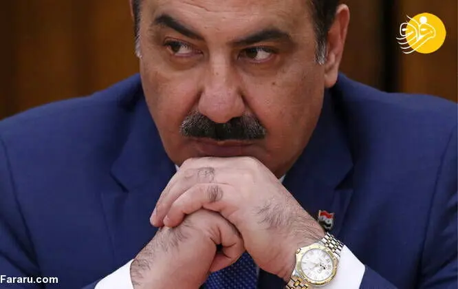 عکس بشار اسد پس زمینه ساعت مچی یک مقام سوری