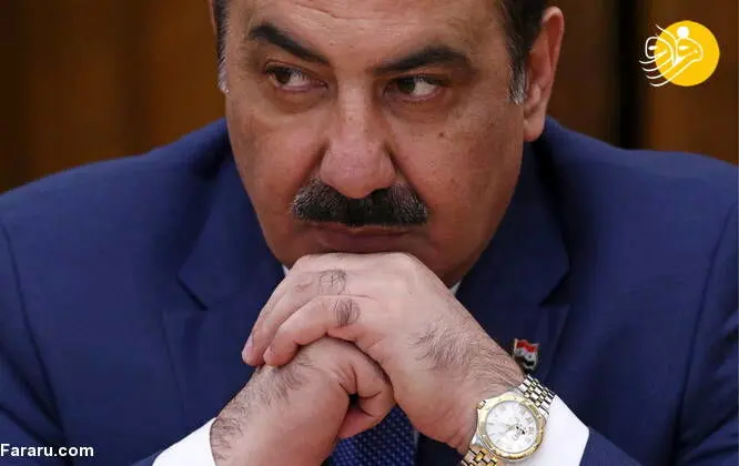 عکس بشار اسد پس زمینه ساعت مچی یک مقام سوری