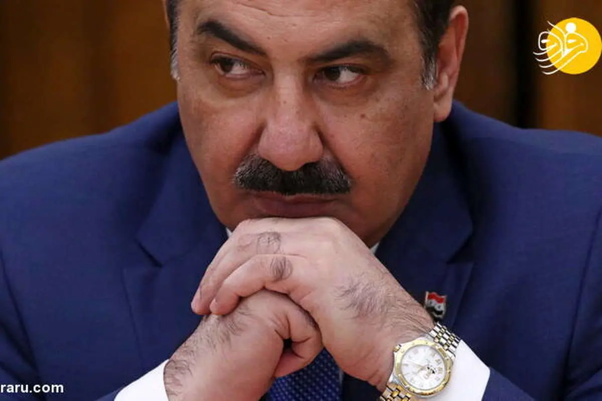 عکس بشار اسد پس زمینه ساعت مچی یک مقام سوری