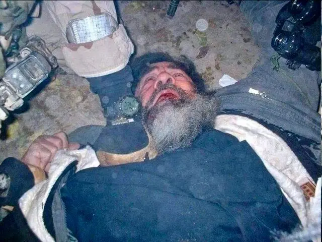 (عکس) تصویری دیده نشده از لحظه دستگیری صدام