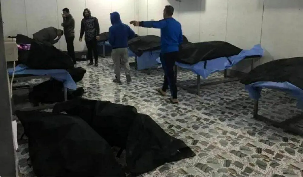 (تصویر) انتقال پیکر شهدای حمله هوایی به فرودگاه بغداد