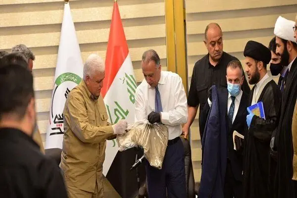 (تصاویر) الکاظمی یونیفرم حشدشعبی بر تن کرد