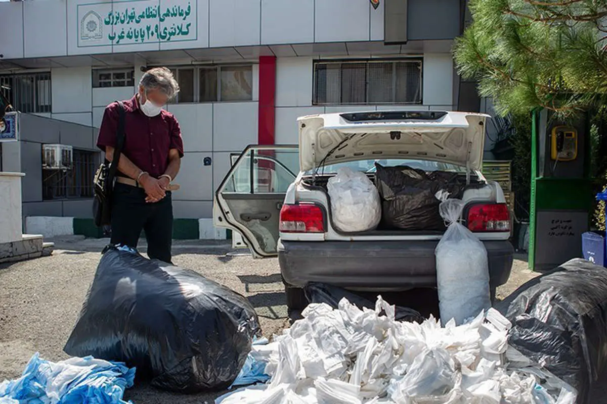 (تصاویر) کشف ۱۰۰ هزار ماسک غیربهداشتی