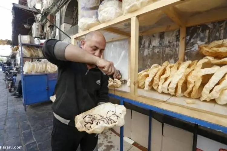 (تصاویر) نان ناعم ویژه افطار در دمشق