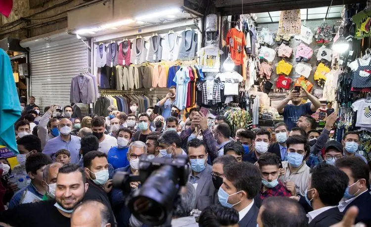 (تصاویر) حضور رئیسی در بازار تهران